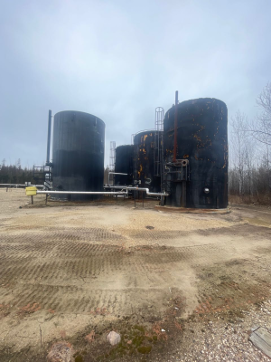 tank farm. five 750bbl production tanks, 3 insulated with tubes, 2 non insulated with tubes. emptied.