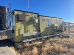 MCC building and a Gardner Denver tri-plex pump housed in separate buildings on same skid